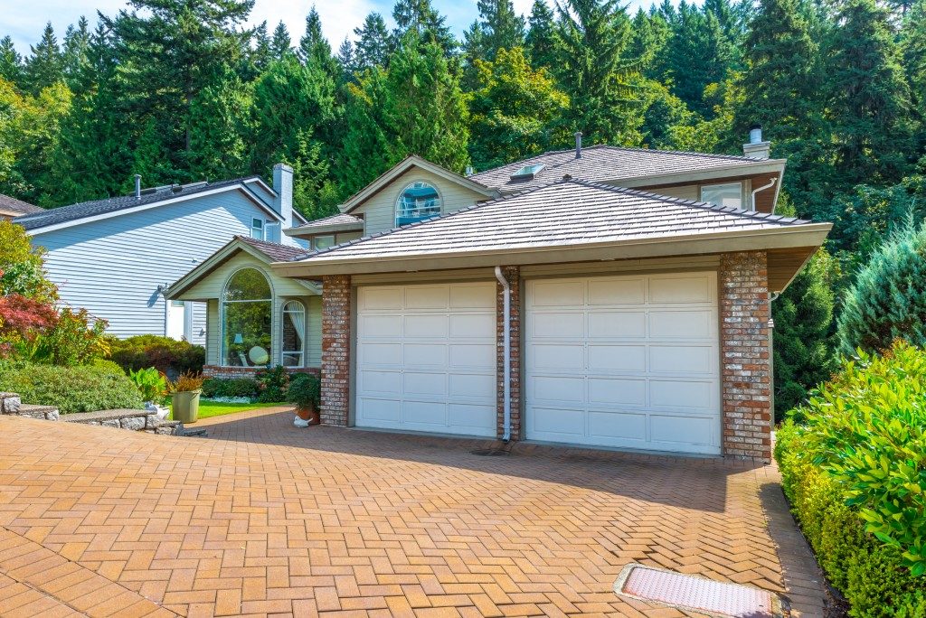 house with paved driveway