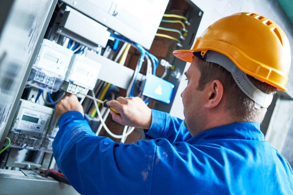 a man doing an electrical work