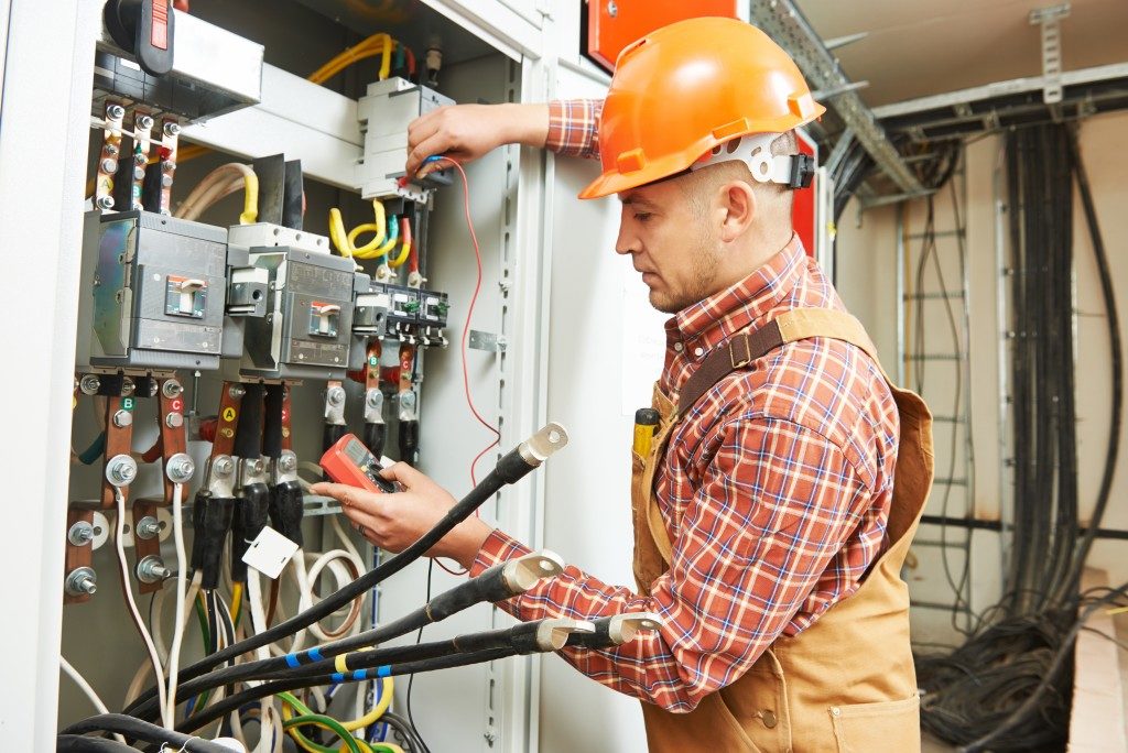 man doing an electrical work