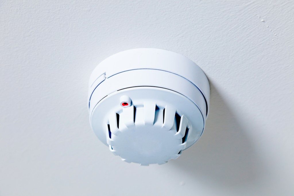 A smoke detector fire alarm installed in a house