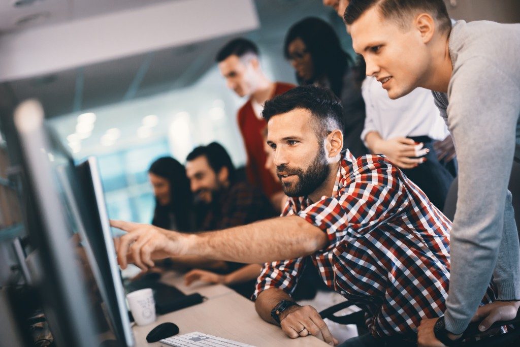 people working, looking their computers