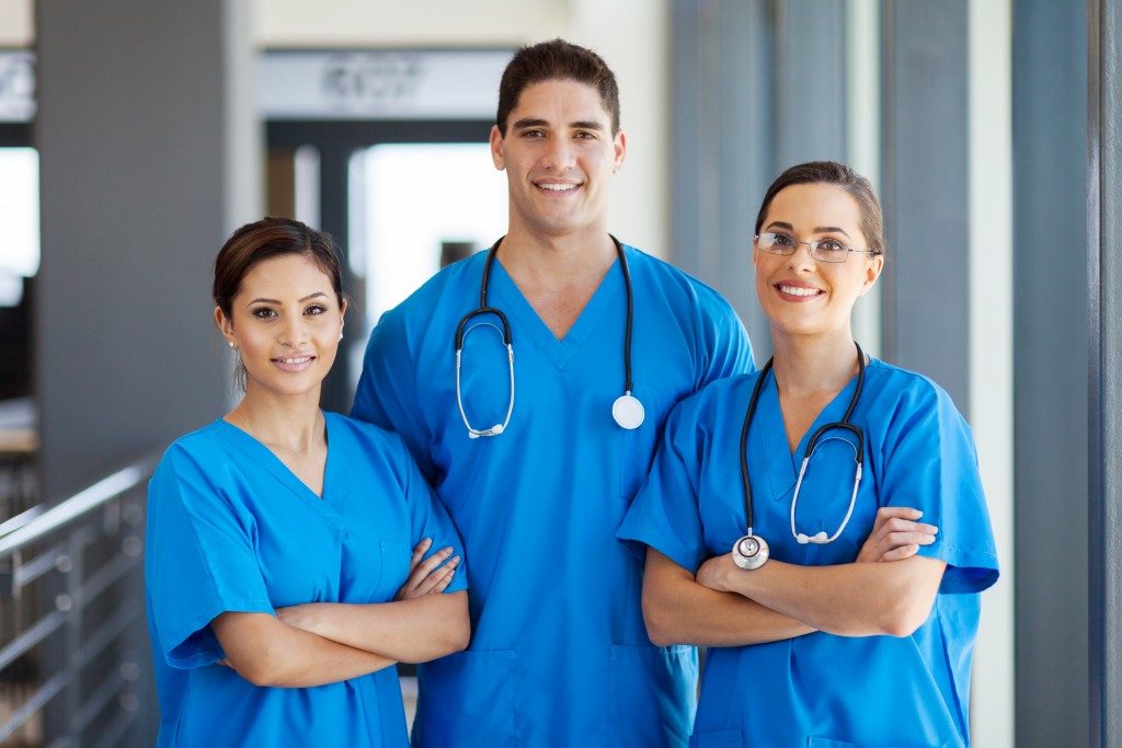 hospital staff members smiling