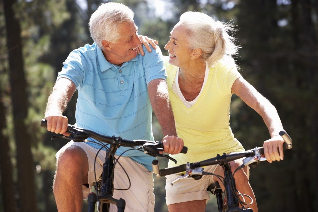 senior couple having a bike ride