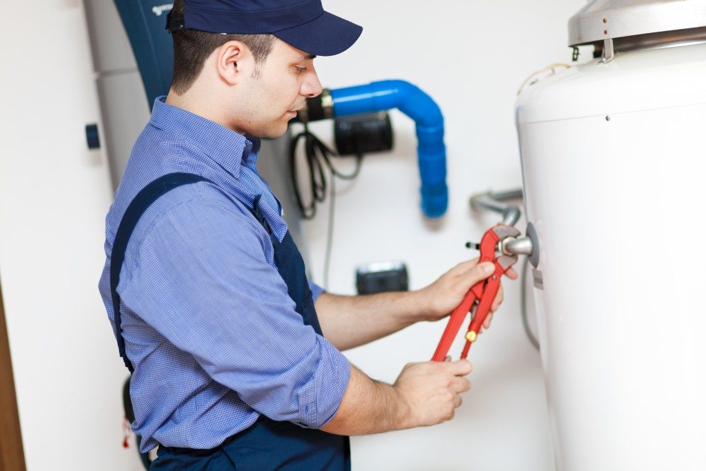 Man fixing the water tank