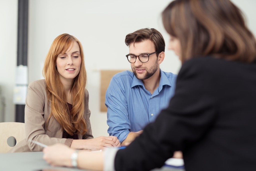 insurance agent and client