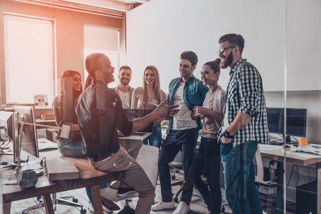 team talking to each other in the office