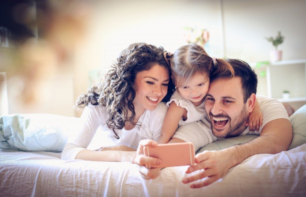 family taking a photo