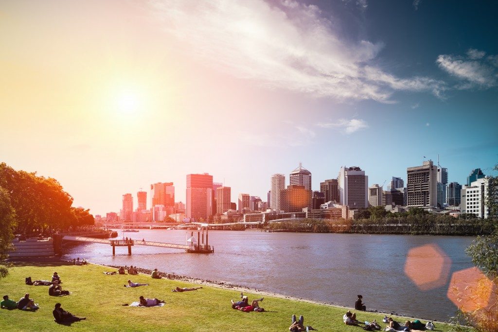 Skyline and people in lawn against a blue sky in Australia