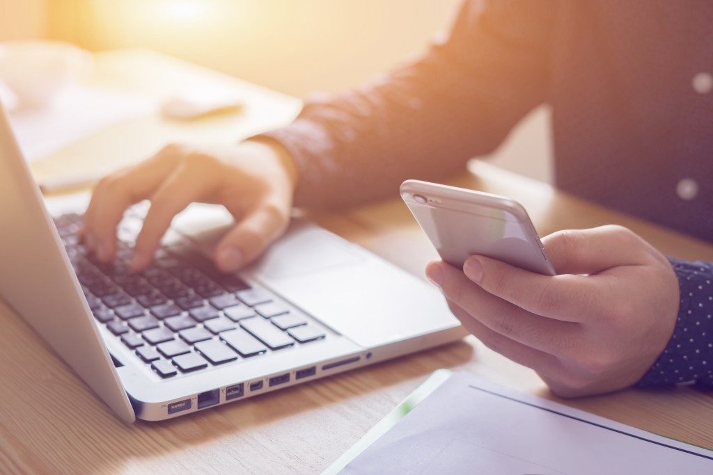 man using his device to contact someone