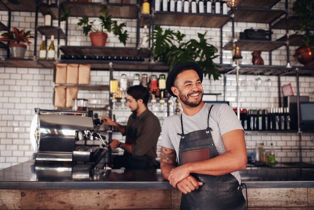 bar owner standing in the counter