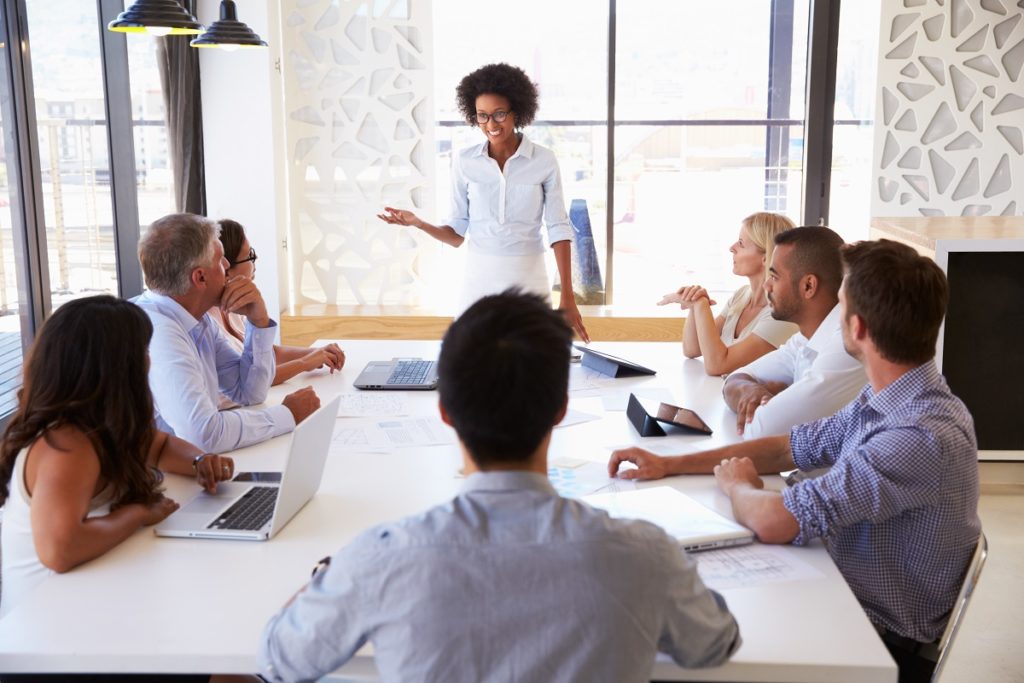 Boss with her team brainstorming