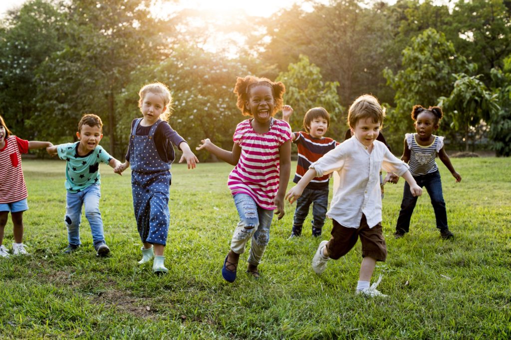 happy kids on running and playing around