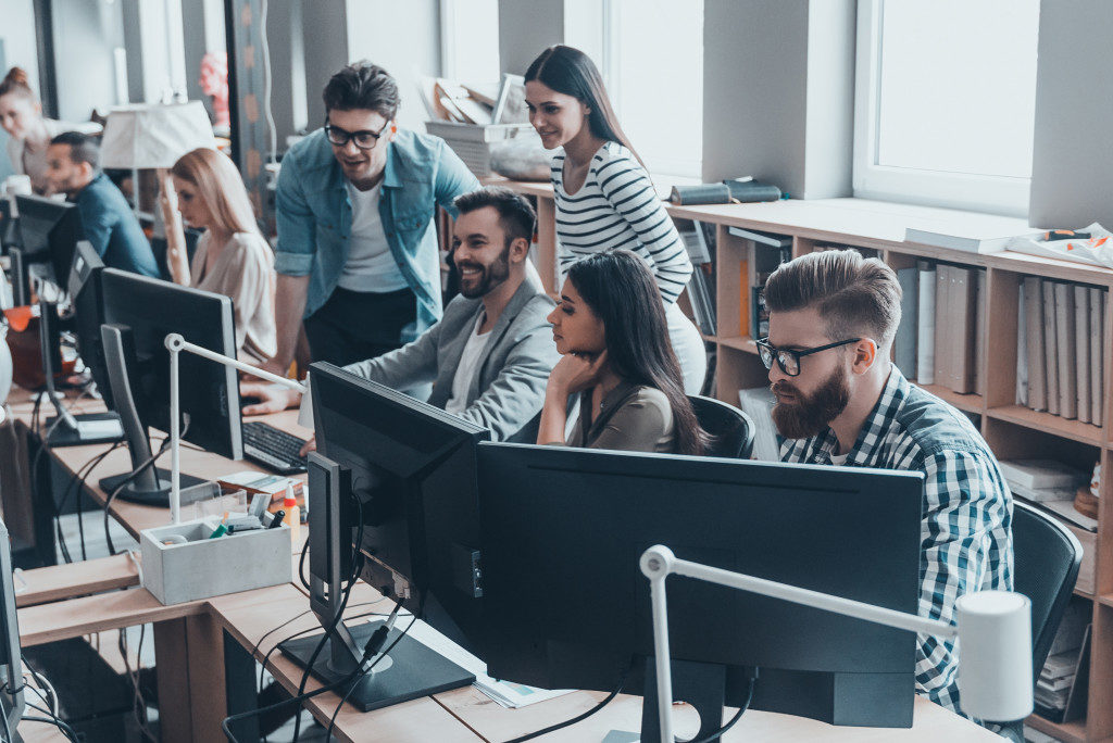 employees working in an open space office