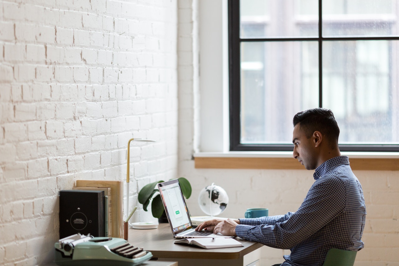 man on his computer