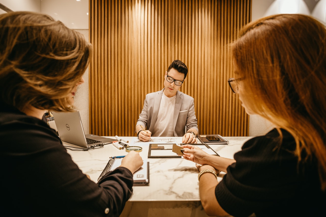 man talking to clients