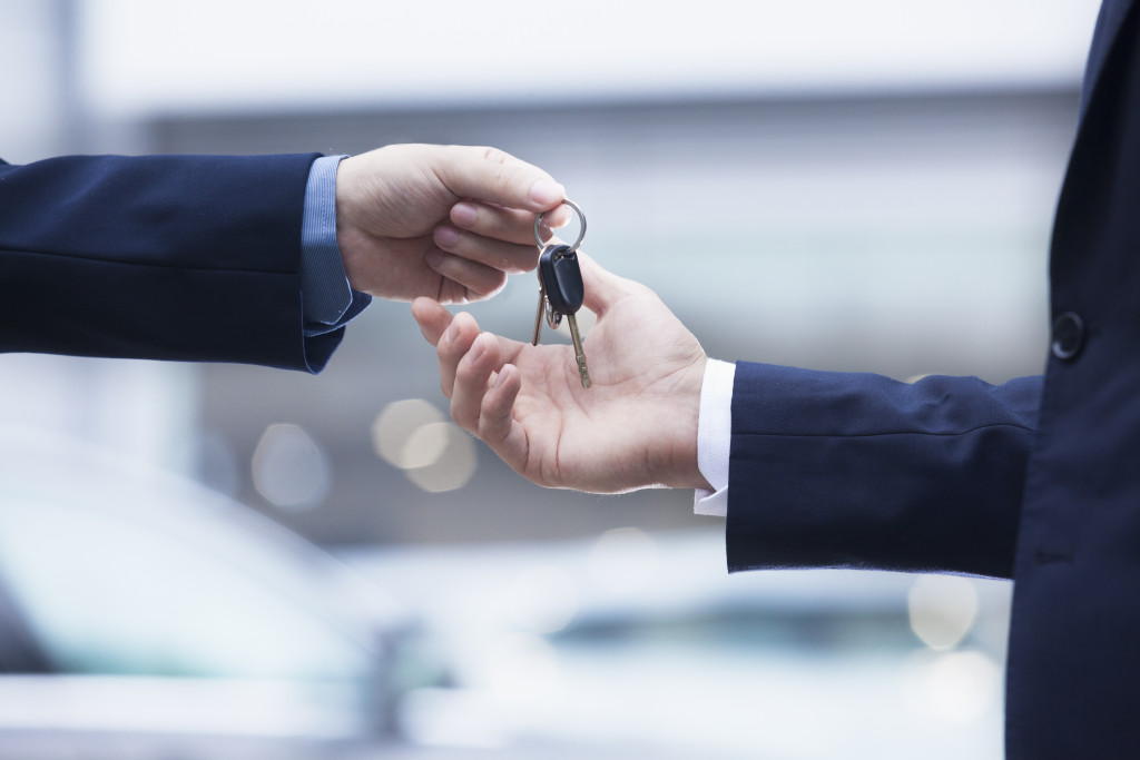 handing over the car keys