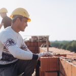 Brick Workers at Construction Site